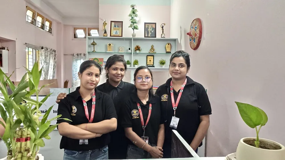 The Sarathi Insurance Point team at the front desk
